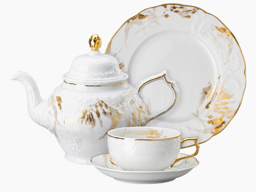 Tea set from Rosenthal’s Heritage Midas collection featuring golden brushstrokes and embossed detailing, designed by Gianni Cinti.