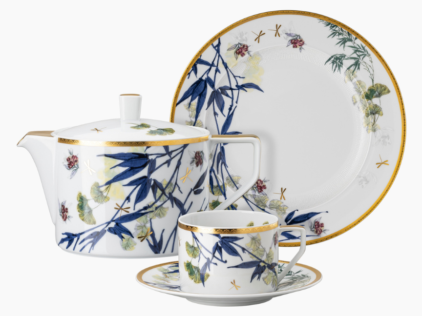 Tea set from Rosenthal's Heritage Turandot collection, designed by Gianni Cinti, featuring Asian-inspired bamboo and floral motifs with golden details.