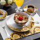 Rosenthal Versace gourmet plates with elaborately arranged dishes