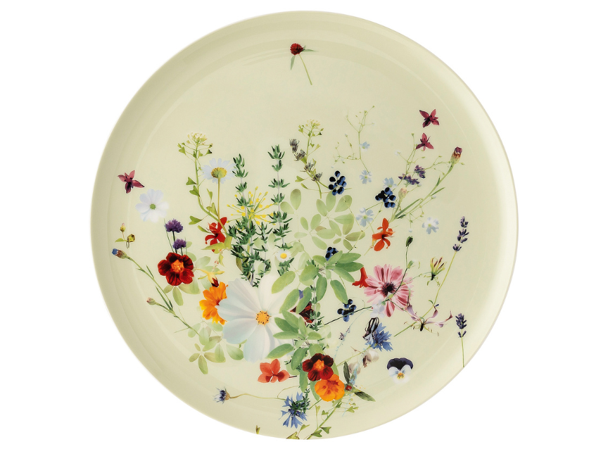 Teller aus der Serie &bdquo;Brillance Grand Air&ldquo; von Rosenthal mit bunten Wildblumen auf zart gelblichem Hintergrund &ndash; inspiriert von sommerlicher Natur.