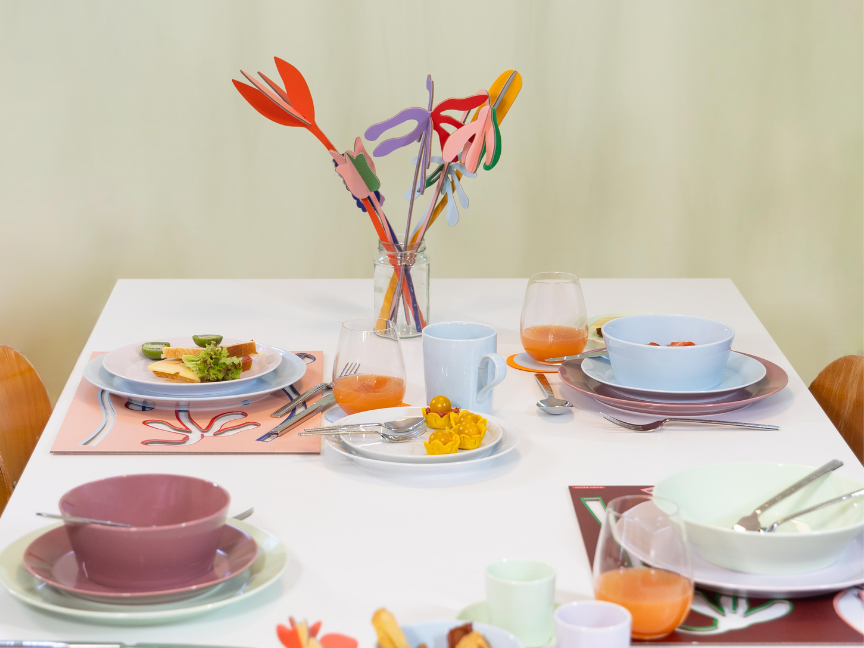Thomas Tric - colourful tableware on a white table