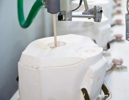 A plaster mould is filled with liquefied porcelain mass
